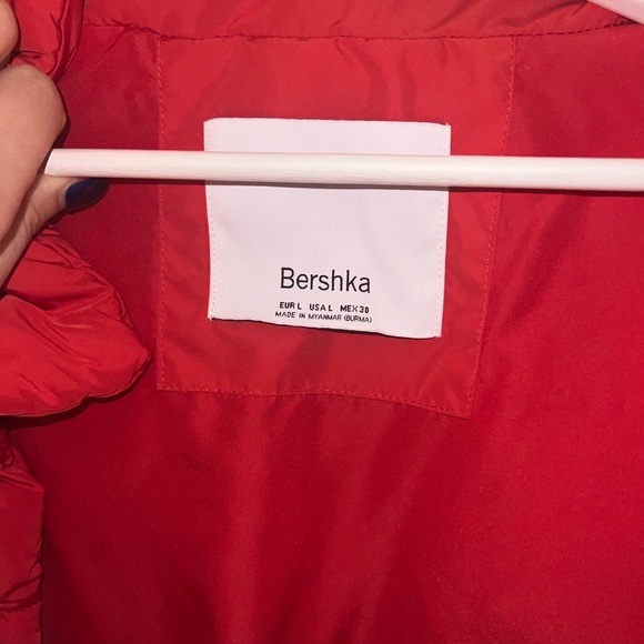 Red puffer jacket with a belt, snaps, and a high collar. The jacket is quilted. - Picture 2 of 4